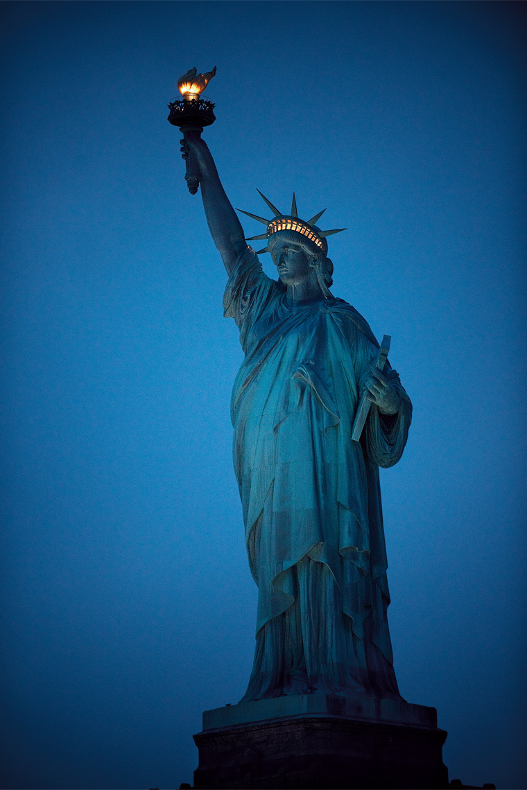 The-Statue-Of-Liberty-At-Night-New-York-Postcard