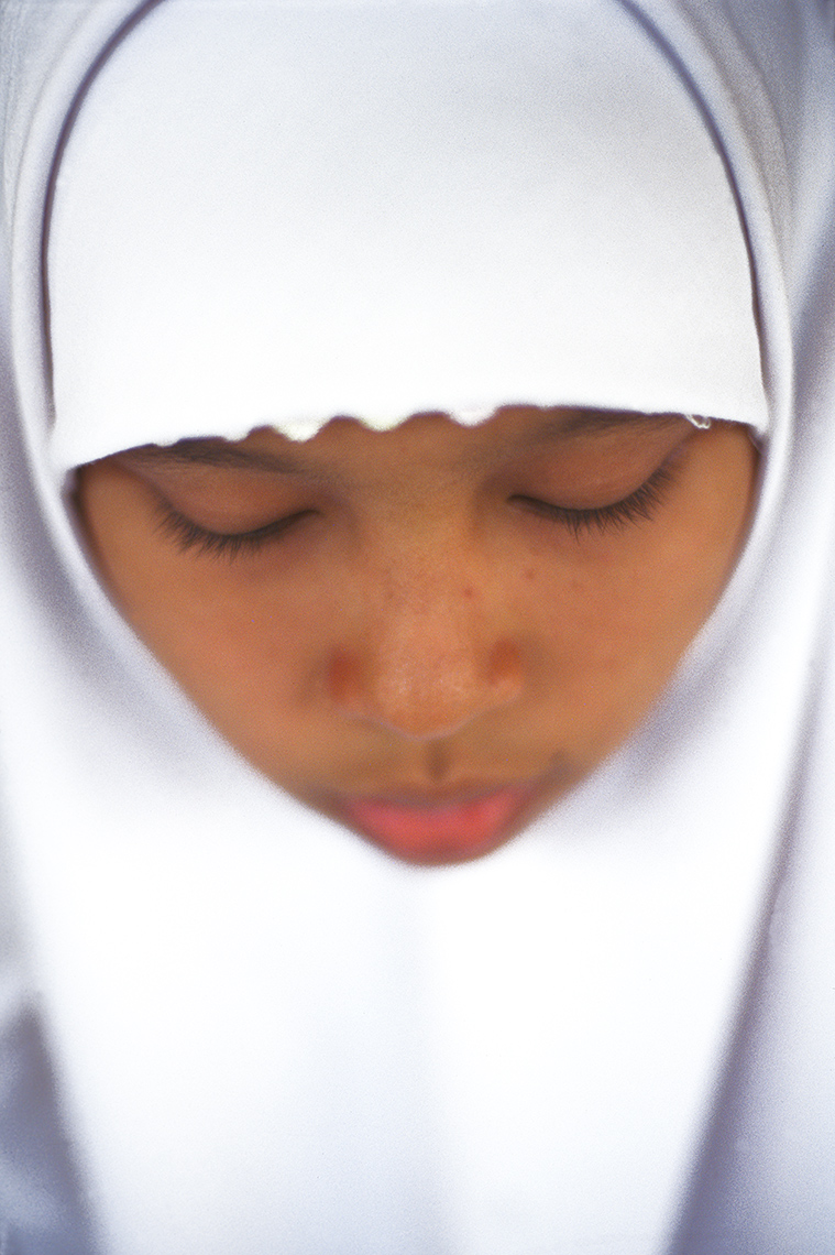 muslim_girl_in_white_in Java, Indonesia